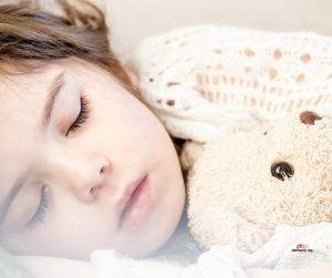 Image of cute toddler girl napping