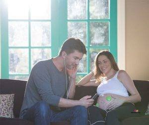 Featured image of couple playing music to baby in womb