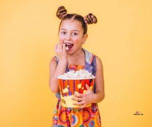 Featured image of cute girl eating popcorn