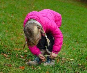 Featured image of little girl in pink jacket tying shoelaces