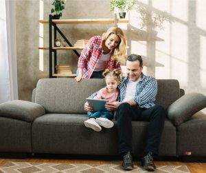 Featured image of Family on sofa with tablet