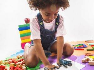 Featured Image of girl making handprint