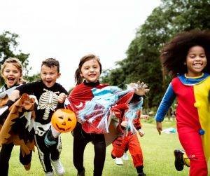 Featured image of happy children running in costumes
