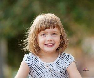 Featured image of happy little girl outdoors