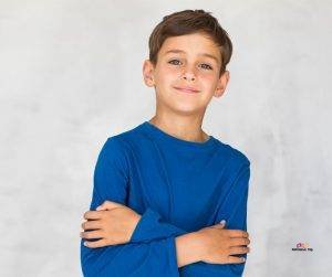 Featured image of boy in blue shirt with crossed arms