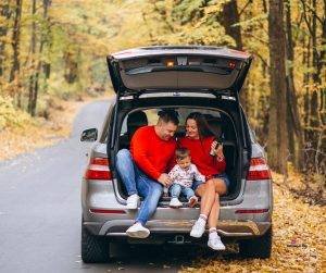 Featured image of family with baby in car in autumn