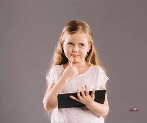 Featured image of thoughtful girl with tablet